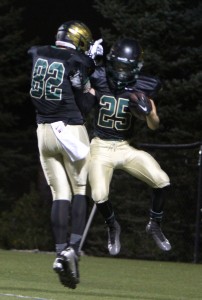 Tristan Dean celebrates after making a touchdown.