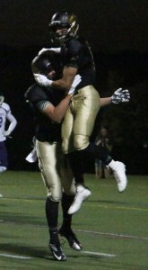 Kellen Parker celebrating after scoring a touchdown.