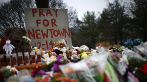 Flowers, candles and stuffed animals at a makeshift memorial in Newtown, Conn., the week after 20 children and 6 adults were killed at Sandy Hook Elementary School.