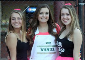 Seniors Cyndie Cordova, Andrea Wirtz and Abby McCreedy prepare for the game to start.