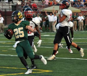 Dean runs the ball for a touchdown.